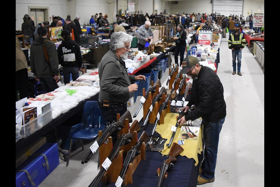 Just a small sampling of the more than 150 tables displaying items at the SSWA Gun Show at the Moose Jaw Exhibition Grounds convention centre on Saturday afternoon.