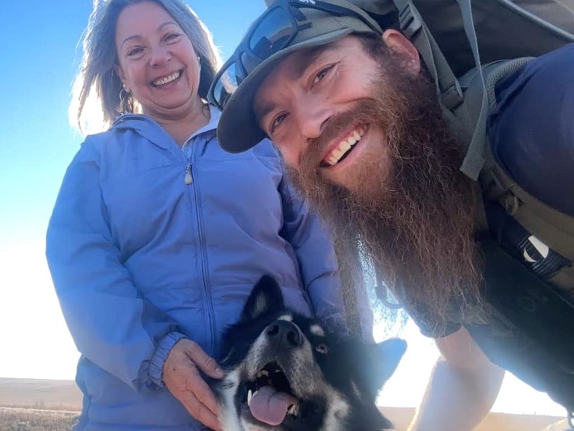 Carol (Momma Carol) Kapay (left) greets Ryan (Bushman Art) Giesbrecht (right) and Nahko (centre) as they arrive in Moose Jaw this November.