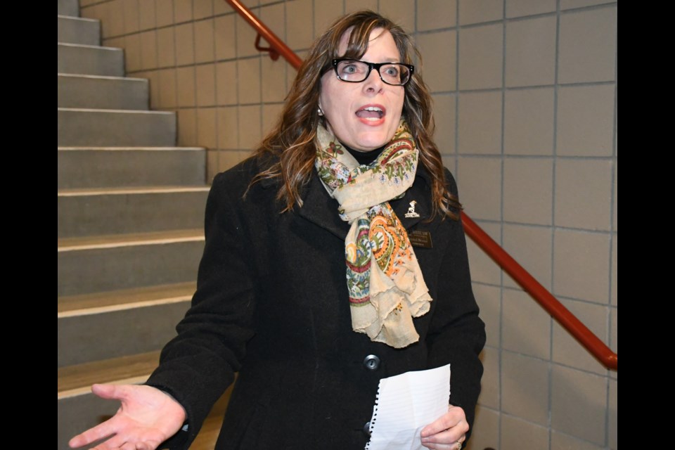 Coun. Crystal Froese speaks about the history of the town bell and its importance at the start of the ceremony. Photo by Jason G. Antonio