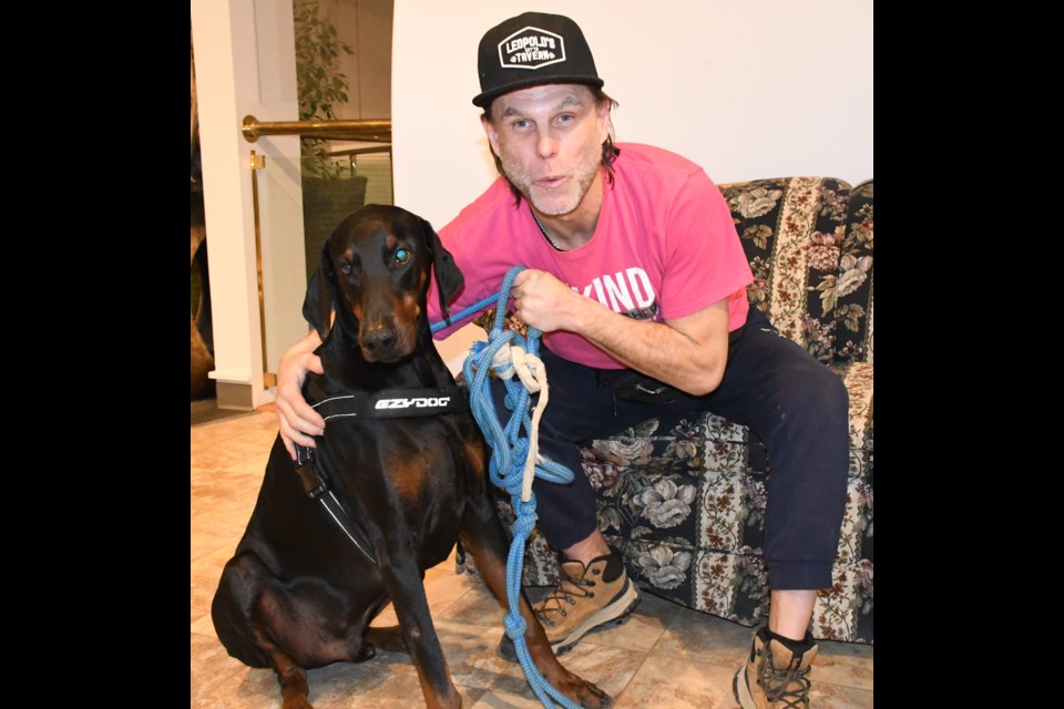 Michael Vernon and Maverick, his emotional support animal, days before they were evicted from Capilano Court. Photo by Jason G. Antonio