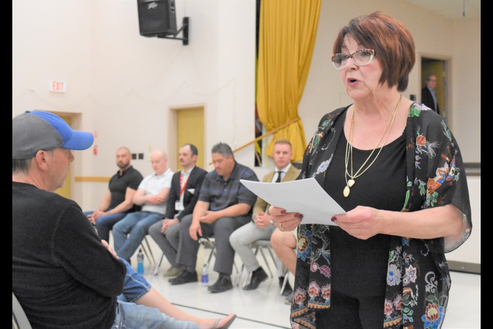 Christine Boyczuk, board chair of the YMCA of Moose Jaw, tells members and staff that the organization is shutting down operations after 114 years existence in the community. Photo by Jason G. Antonio 