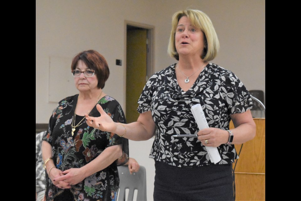 YMCA board chair Christine Boyczuk (left) and interim CEO Diana Deakin-Thomas answer questions during the community meeting on May 28. Photo by Jason G. Antonio