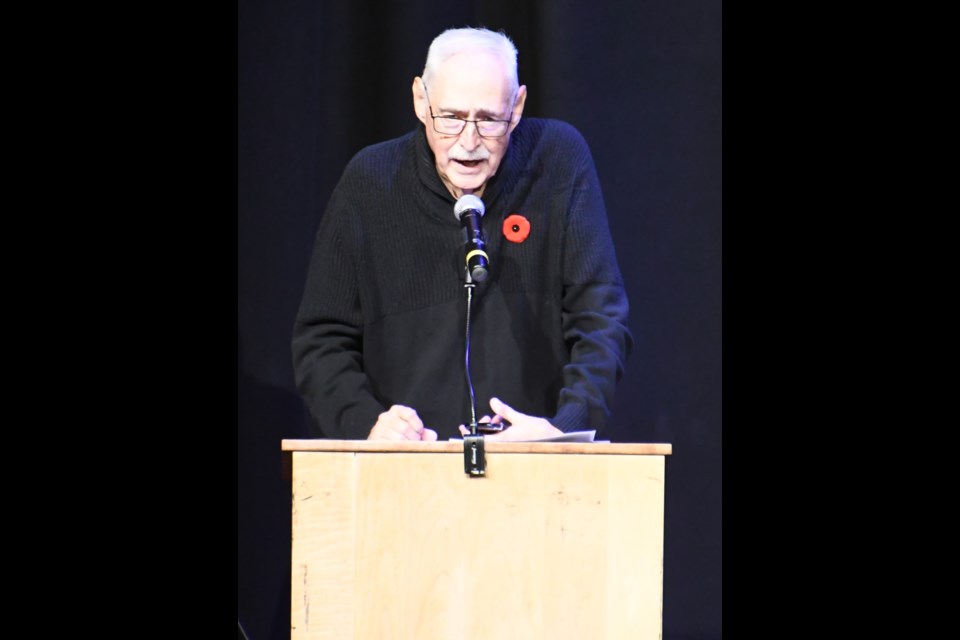 Lyle Johnson acts as the political forum MC. Photo by Jason G. Antonio