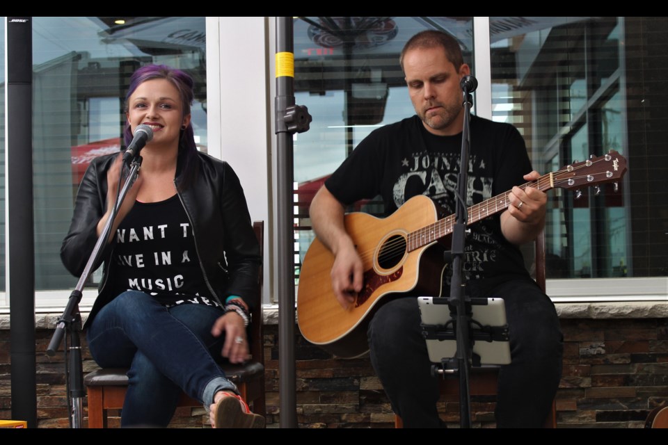 Regina artist Amy Nelson impressed with some of her own music, performed with guitarist Harreson James from Saskatoon.