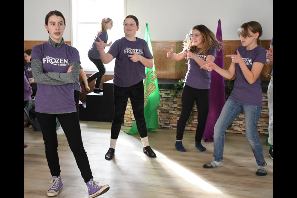 "Olaf the Snowman," as portrayed by Millie Watson (left), is the centre of attention during a song. Photo by Jason G. Antonio