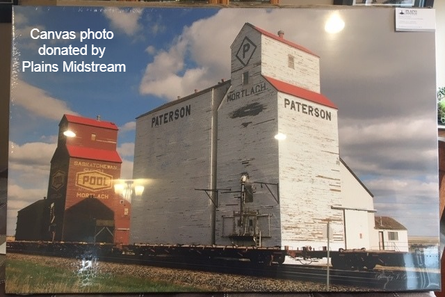 A canvas picture of grain elevators in Mortlach is one item up for auction, to be held on Feb. 8. Photo courtesy Facebook