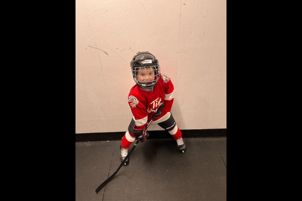 Jagger with his hockey device that was funded thanks to public support of The War Amps