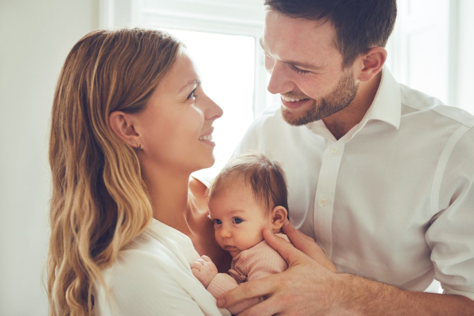 parents and baby stock