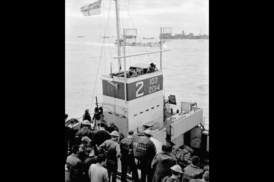 A Landing Craft Tank (LCT) bringing casualties out to H.M.C.S. PRINCE DAVID from the Normandy beachhead, France, 6 June 1944.

