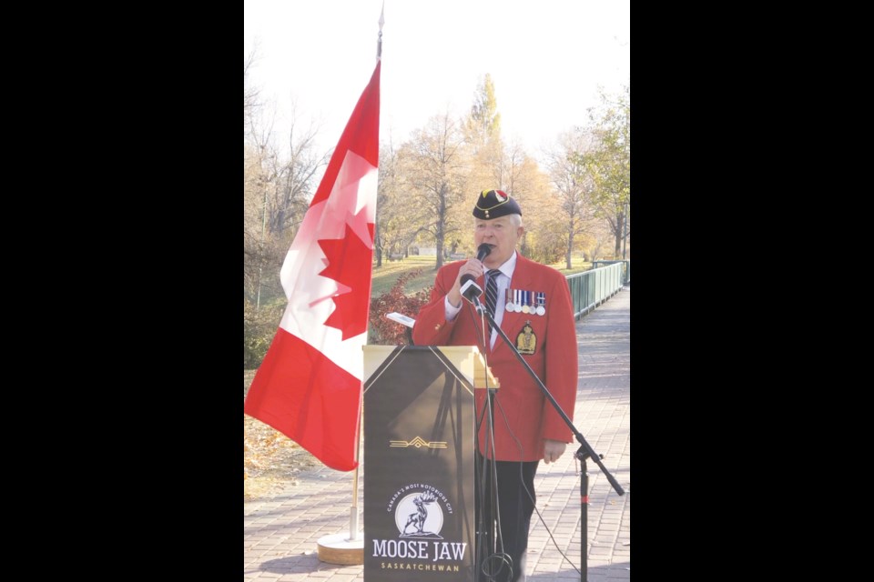 Garth Hampson, a retired RCMP veteran and former Moose Javian, sings O Canada at the start of the veterans' banner campaign. Photo by Jason G. Antonio