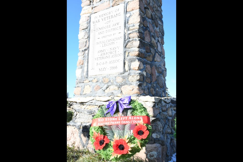 Two wreaths were placed in front of the cenotaph at the Rosedale Cemetery as part of the No Stone Left Alone ceremony. Photo by Jason G. Antonio