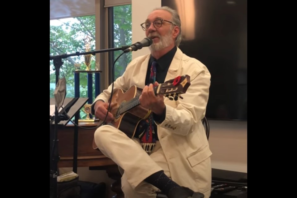 Mario Crevier, a musician and musical therapist who also performs as Elliott Barraclough, performs at a seniors' home. Photo courtesy YouTube