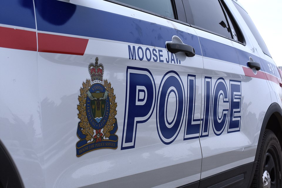 Moose Jaw police car face right