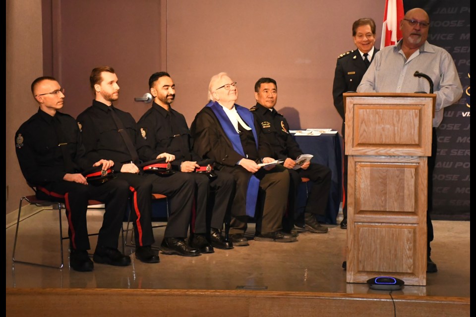 Doug Blanc, a police board commissioner and city councillor, brings greetings on behalf of both groups. Photo by Jason G. Antonio