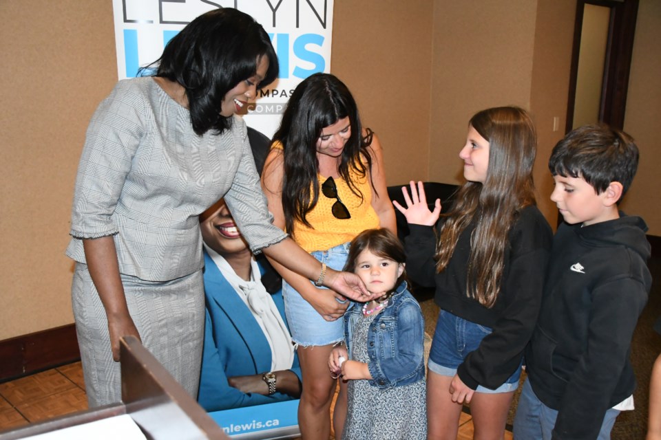 MP Leslyn Lewis meets with a family after her event in Regina on July 28. Photo by Jason G. Antonio 