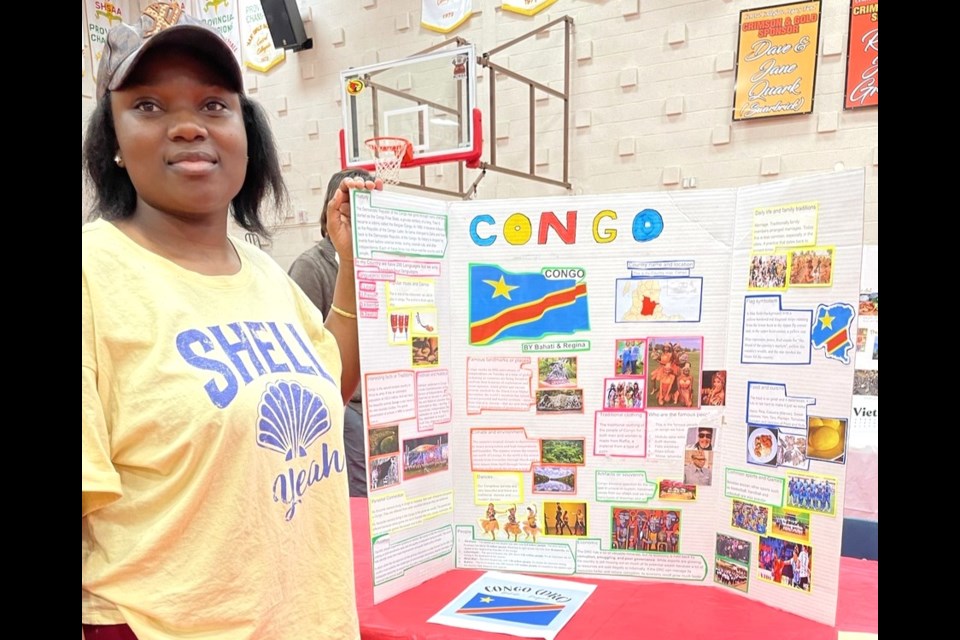 A Central Collegiate student showcases her display board representing Congo on Nov. 21.