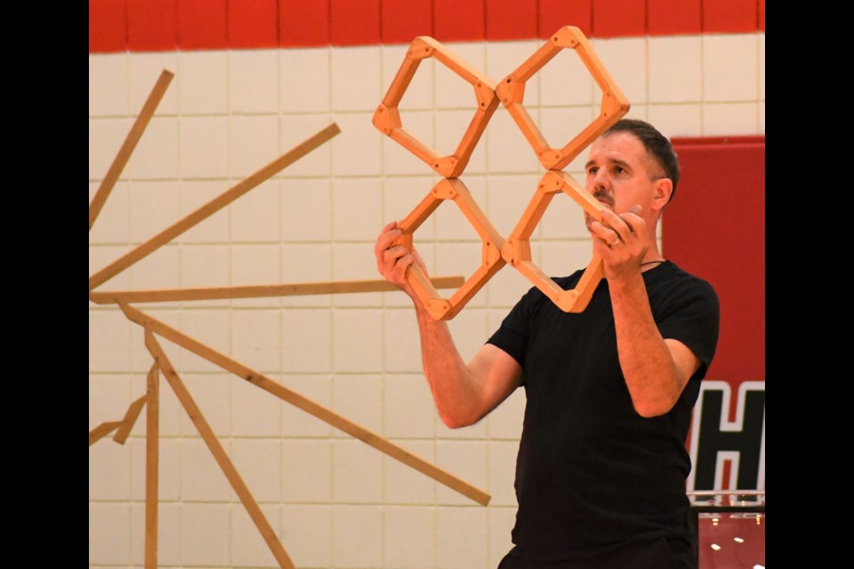 Juggler Greg Kennedy uses magnetized blocks to create different shapes during a performance at King George Elementary School on Sept. 26. Photo by Jason G. Antonio