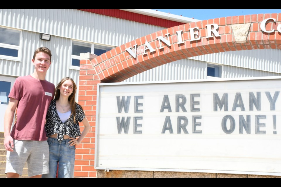 Vanier Collegiate graduates Eric Meili and Michaela DeCorby pose outside the school. Both recently spoke about their time in high school and hopes for the future. Photo by Jason G. Antonio 