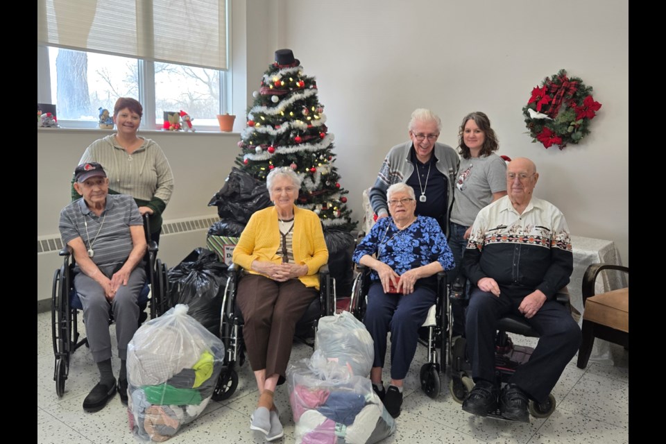 In the back, from left, are Bonita, Chateau St. Michael's director of care, Jack, a resident, and Krista, the activity co-ordinator. In front, from left, are residents Gill, Janet, Bernice and Lorne. Photos submitted