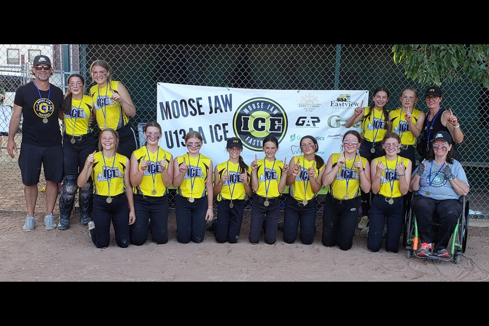 The Moose Jaw Ice with their gold medals from the Moose Jaw and District Minor Girls Fastball U13 AA tournament.
