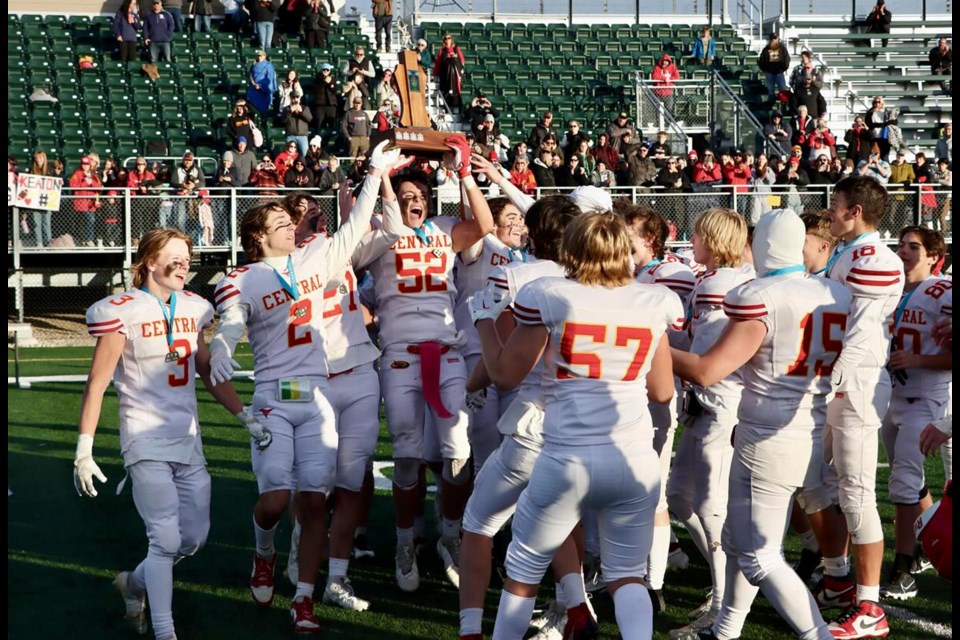 The Central Cyclones celebrate with the SRFL championship trophy on Saturday afternoon at Leibel Field in Regina. 