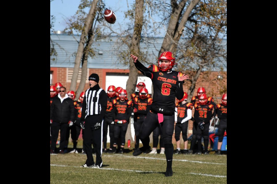 Central’s Wil Ansell fires a pass to the end zone…