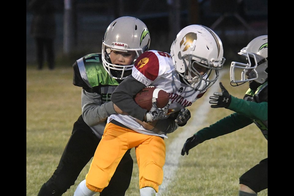 Estevan Chargers beat Weyburn during rainy football game 