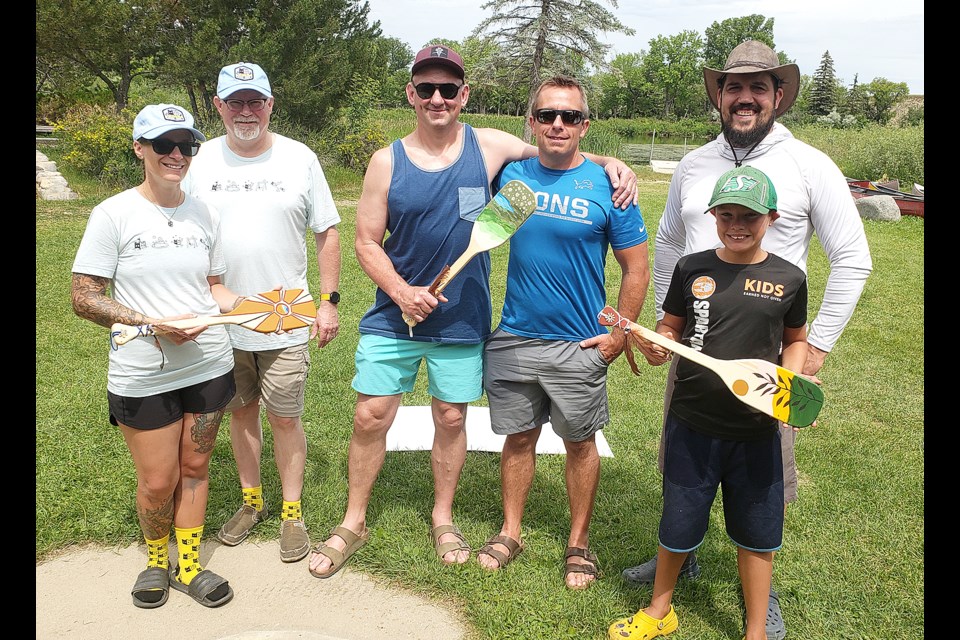 The top three finishers in the Kayak 4 Kidsport Corporate Challenge were the Sandbox Mutual Insurance team of Tessa Silversides and Trent Beatty (third place), Firefighters 2 team of Rob Halsall and Rod Ansell (first place) and Dan and Ethan Whitbread (second place).