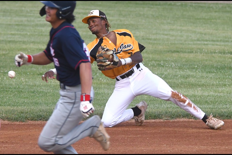 Miller Express second baseman Marcerio Allen fires to second to get Weyburn’s Nick Teng on this second-inning ground ball.