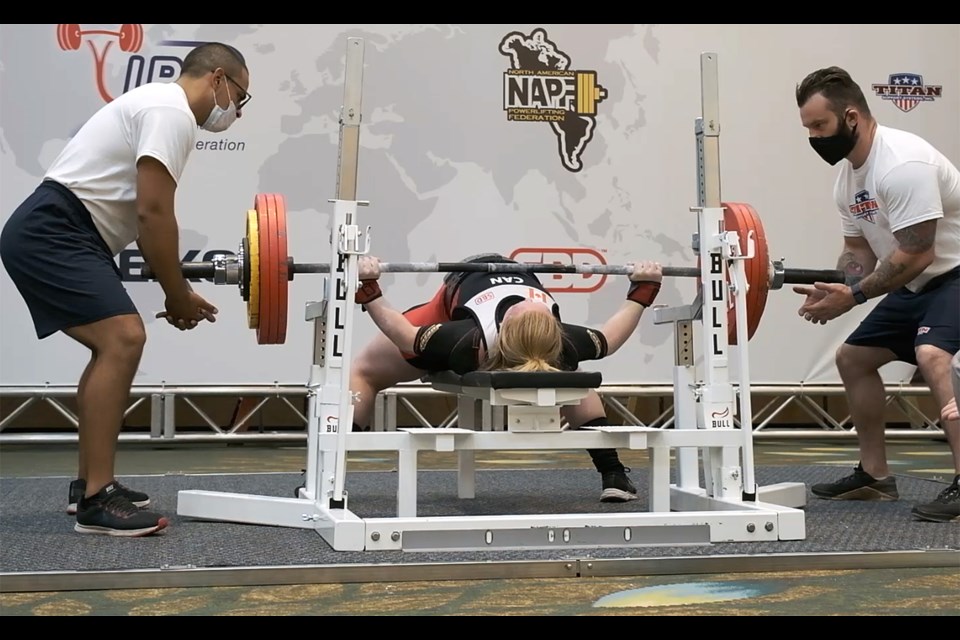 Okotoks powerlifter makes world record lift 