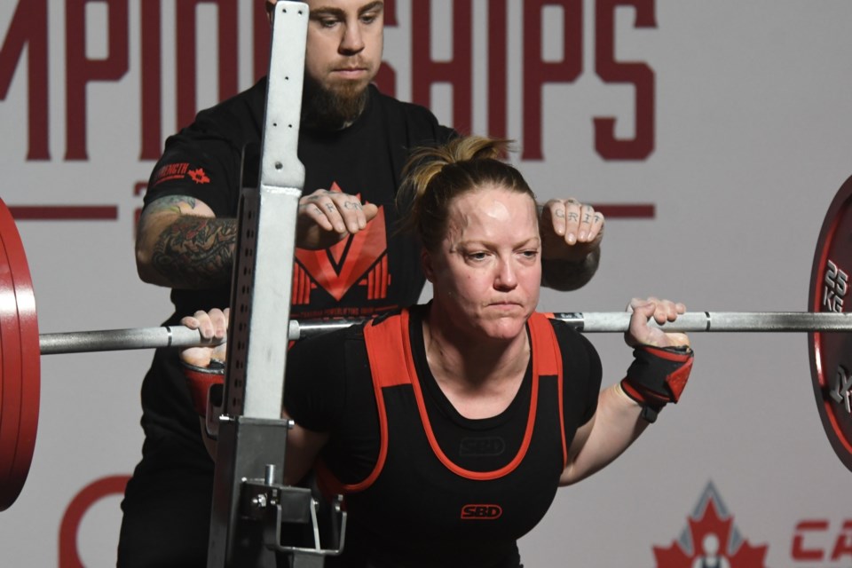 Moose Jaw’s Rhaea Stinn competes in the squat during the 2025 CPU National Championships.