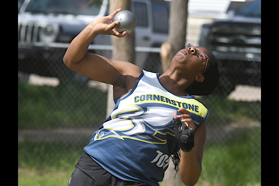 Cornerstone Christian School competitor Ademide Adewumi broke the junior girls shot put district record with this throw and would later break the district discus record.