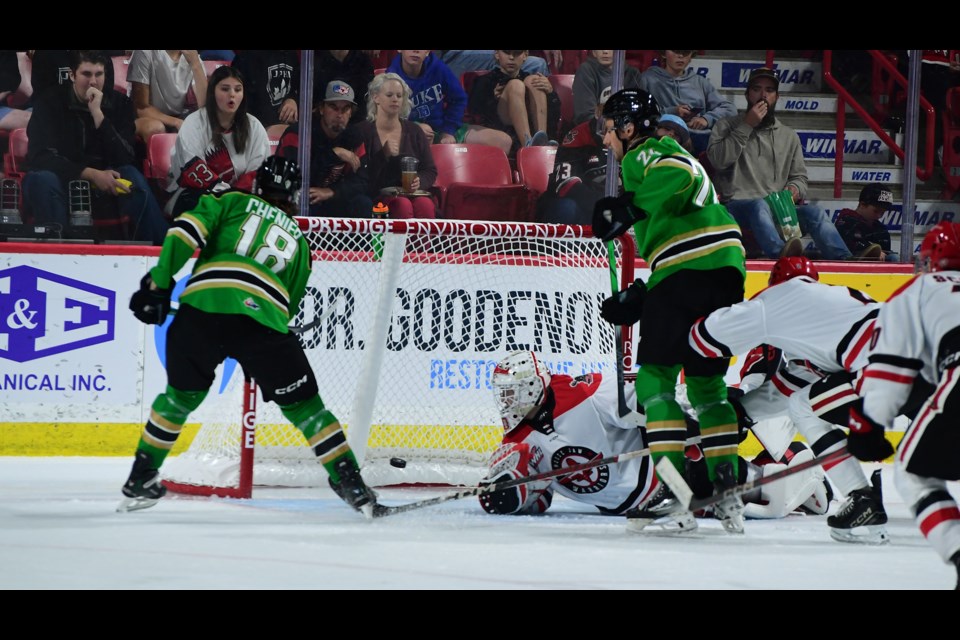 Prince Albert's Oli Chenier scores one of his two goals in the third period.