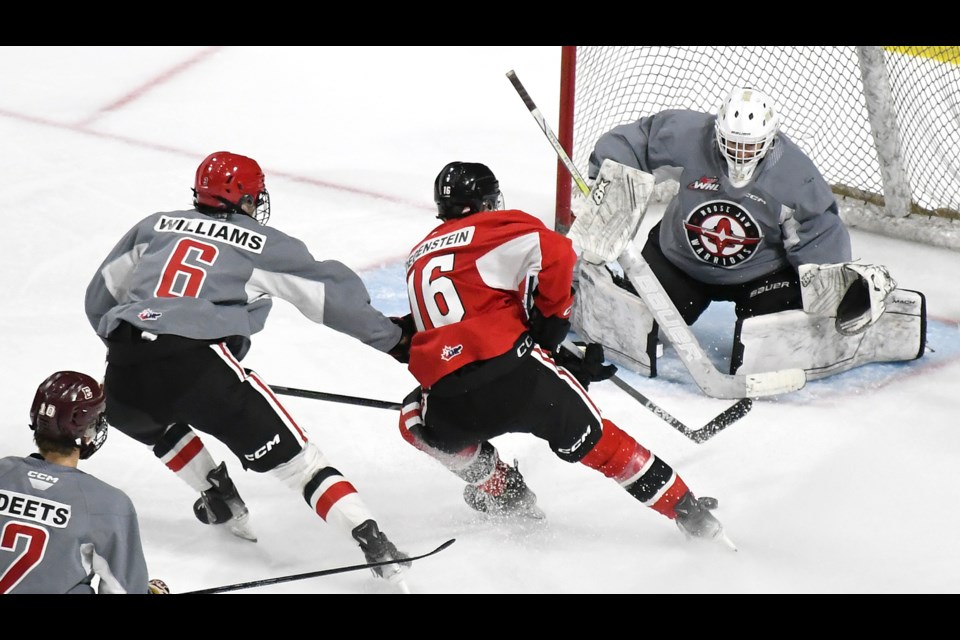 Action from the Moose Jaw Warriors Red-Grey intrasquad game on Sunday afternoon at the Moose Jaw Events Centre. | Randy Palmer