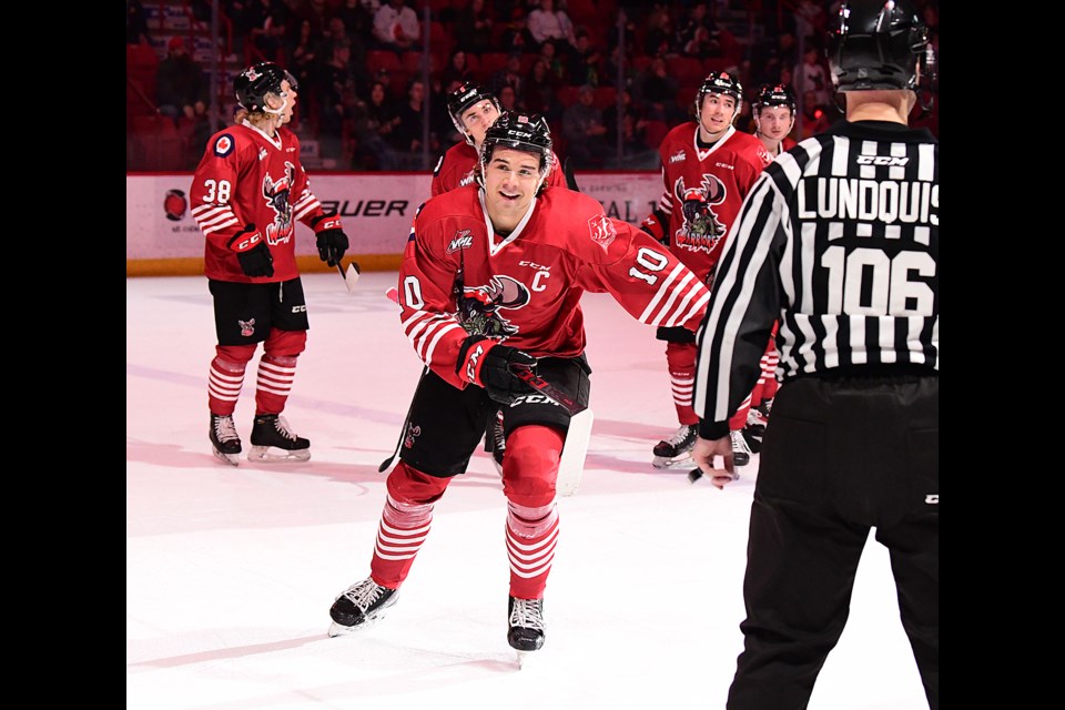 Daemon Hunt leads the flyby after the game's third goal.