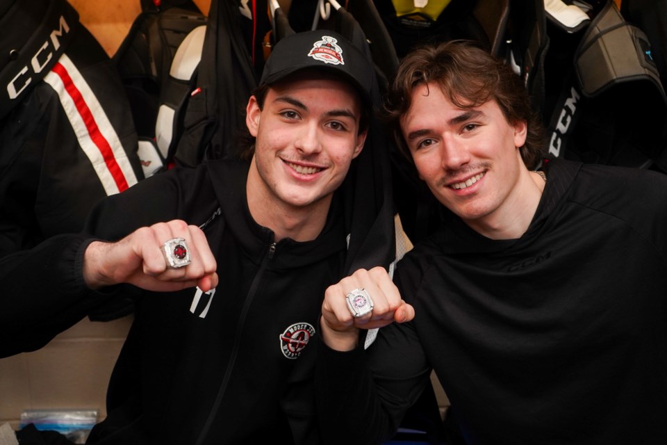 Lynden Lakovic and Brayden Yager show off their 2023-24 Western Hockey League Championship rings.