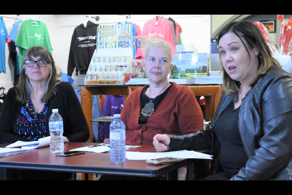 Tourism Moose Jaw’s Margaret Moran, past board president, Kelly Carty, current board president, and executive director Jacki L’Heureux-Mason discuss the past year and upcoming activities during Tourism Moose Jaw’s annual general meeting on April 30. Photo by Jason G. Antonio 