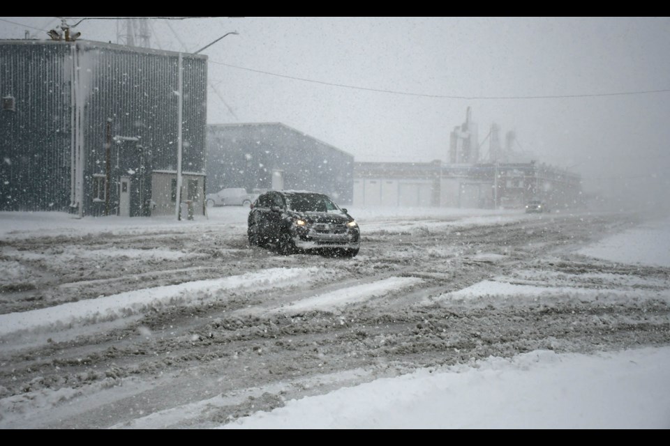 The corner of High Street and Fifth Avenue showed how conditions were deteriorating Sunday afternoon.