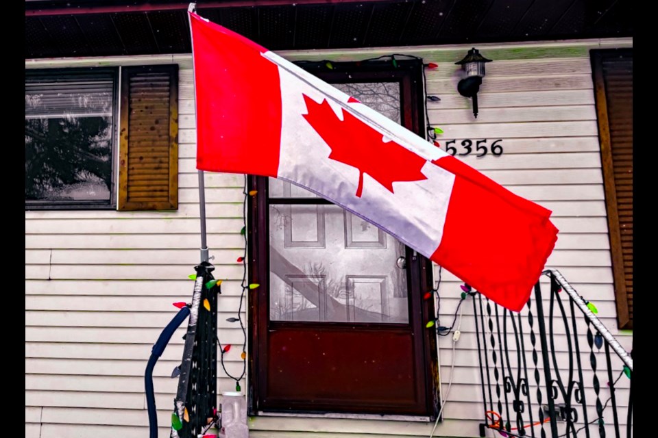 The front of Innisfailian Jim Carroll's home on Feb. 15 that proudly has the Canadian flag waving to mark its 60th anniversary. 
Johnnie Bachusky/MVP Staff