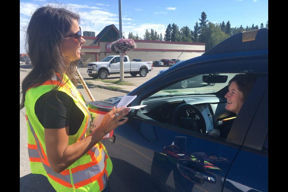 Sundre resident Sammy Shyback was among 20 volunteers who on Friday, Sept. 13 stepped up to support the Greenwood Neighbourhood Place Society’s annual Charity Check Stop alongside members of the municipality’s fire department as well as RCMP and community peace officers.
Simon Ducatel/MVP Staff