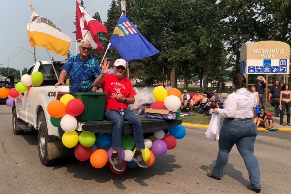 Town of Carstairs Mayor Lance Colby and councillor Marty Ratz ride on the colourful town float during the Beef & Barley Days parade on Saturday. 
Dan Singleton/MVP Staff