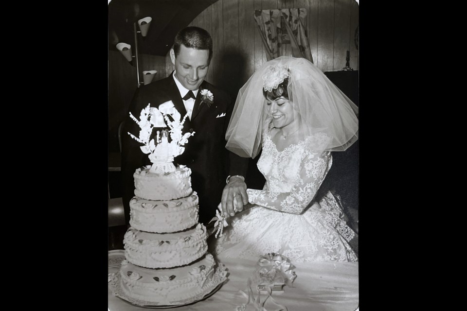 Mel and Bonnie Giles cut the cake on their wedding day.
Photo courtesy of Punch Inc. & Seasons Olds