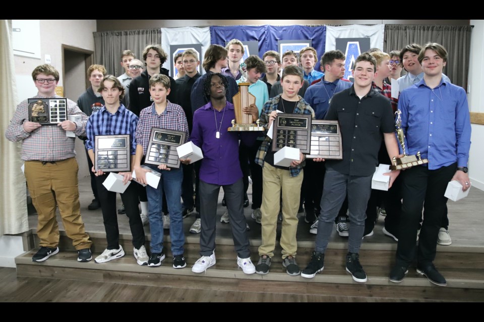 Members of the bantam Bulldogs, including award winners, pose for a photo during the banquet.
Doug Collie/MVP Staff