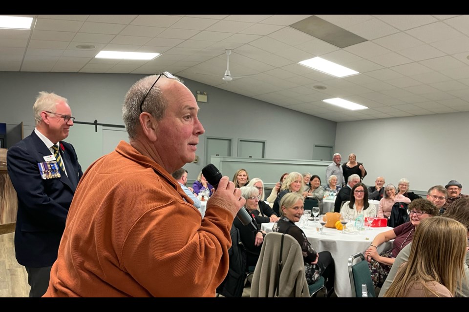 Mark Kemball, the emcee for the 2023 Innisfail Business Awards gala on Nov. 1 at the Innisfail Golf Club, spearheads a live auction at the event. Johnnie Bachusky/MVP Staff