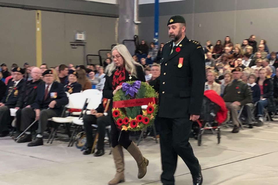 Silver Cross Mother Susan Curnow places a wreath during the Carstairs Remembrance Day service.