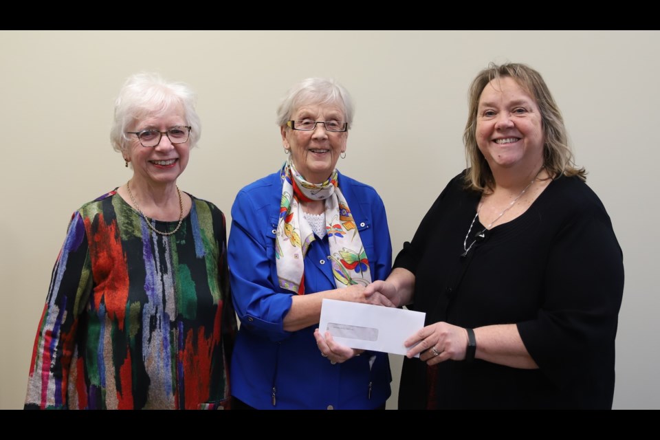 Olds & District Kiwanis Music Festival board chair Trudy Ballard, far right, receives a cheque for $1,000 from Community Lifestyles Committee co-chairs Bernice Lynn, far left, and Erica Sweetman.
Doug Collie/MVP Staff