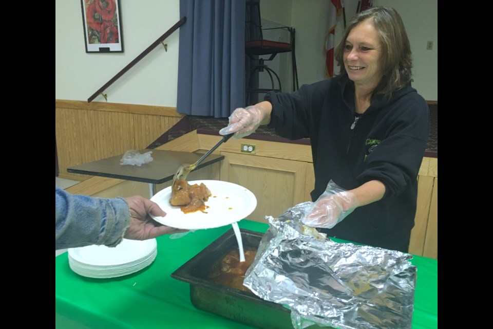 Cooking for Kindness volunteer Marie Beaudoin starts stacking up a plate with a hearty meal on Wednesday, Nov. 15 at the Royal Canadian Legion Sundre Branch #223, which hosts the monthly luncheons.
Simon Ducatel/MVP Staff