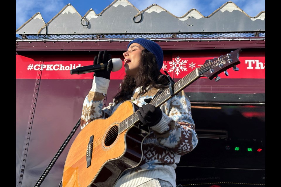 Sofia Camara, a 20-year-old singer, songwriter and multi-instrumentalist, gave a short but powerful show-opening performance at the Innisfail stop on Dec. 13 for the CPKC Holiday Train. 
