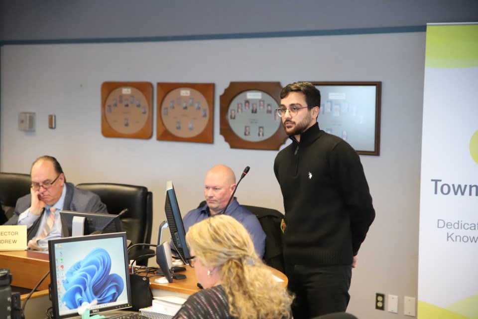 During a public hearing at an Olds town council meeting, Sarmad Abbasi, a planner with Parkland Community Planning Services, explains why it was proposed that an Olds land use bylaw be amended to allow daycare facilities in commercial shopping districts.