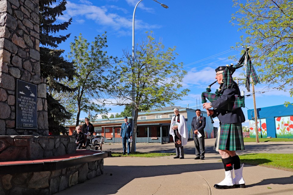 Innisfail legion piper Michael McLetchie at the Innisfail Cenotaph during the special ceremony on June 6 to mark the 80th anniversary of D-Day. Johnnie Bachusky/MVP Staff